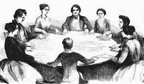 Image of people at a seance